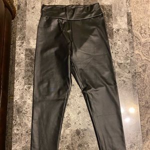 Never worn black fake leather leggings
